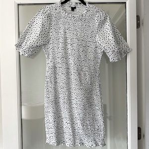 JCrew Smocked Blue and White Polkadot dress with small puff sleeves and ruffle